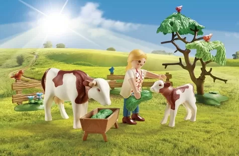 fattoria con trattore e animali