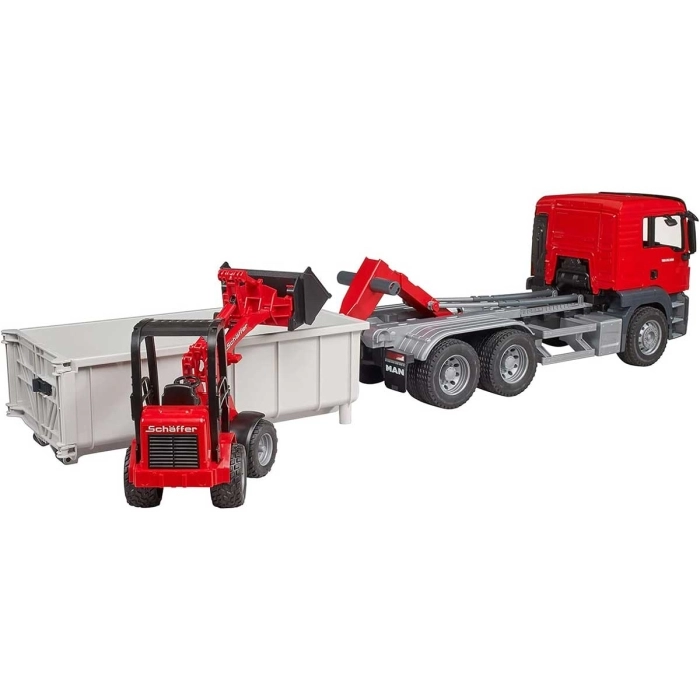 man tgs truck con container ribaltabile + schaffer compact loader 2630